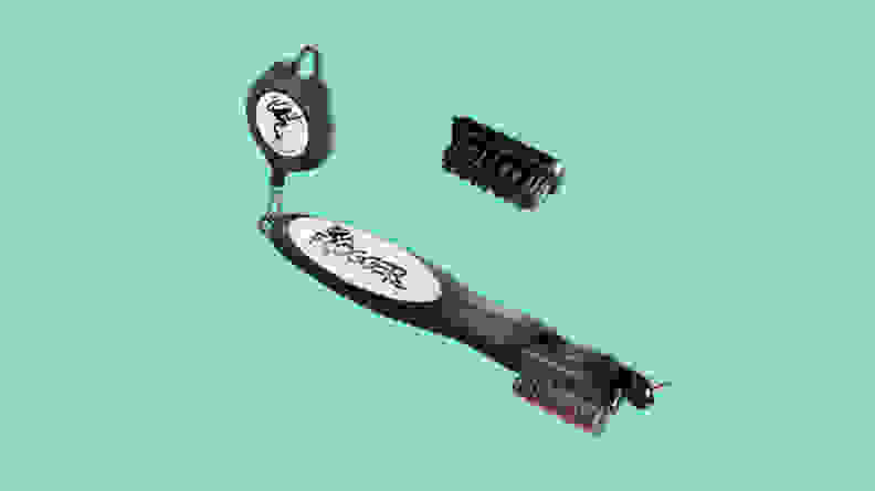 Frogger Golf BrushPro Retractable Dual-Bristle Club Brush/Groove Cleaner on a teal background.