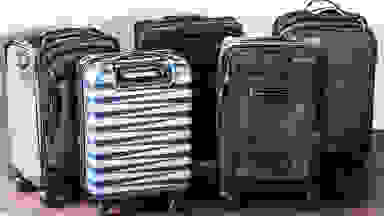 Osprey carry-on, Samsonite carry-on, and TravelPro carry-on next to each other